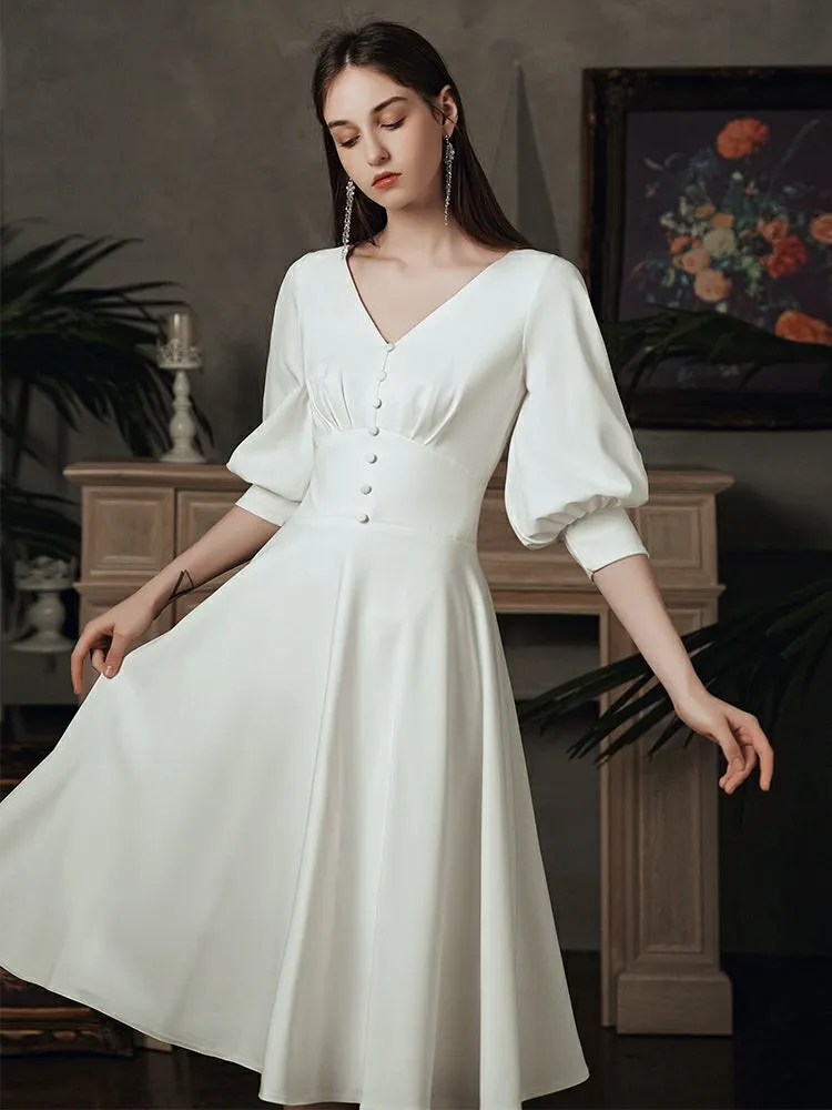 The Kelista Puff Sleeves Midi Gown