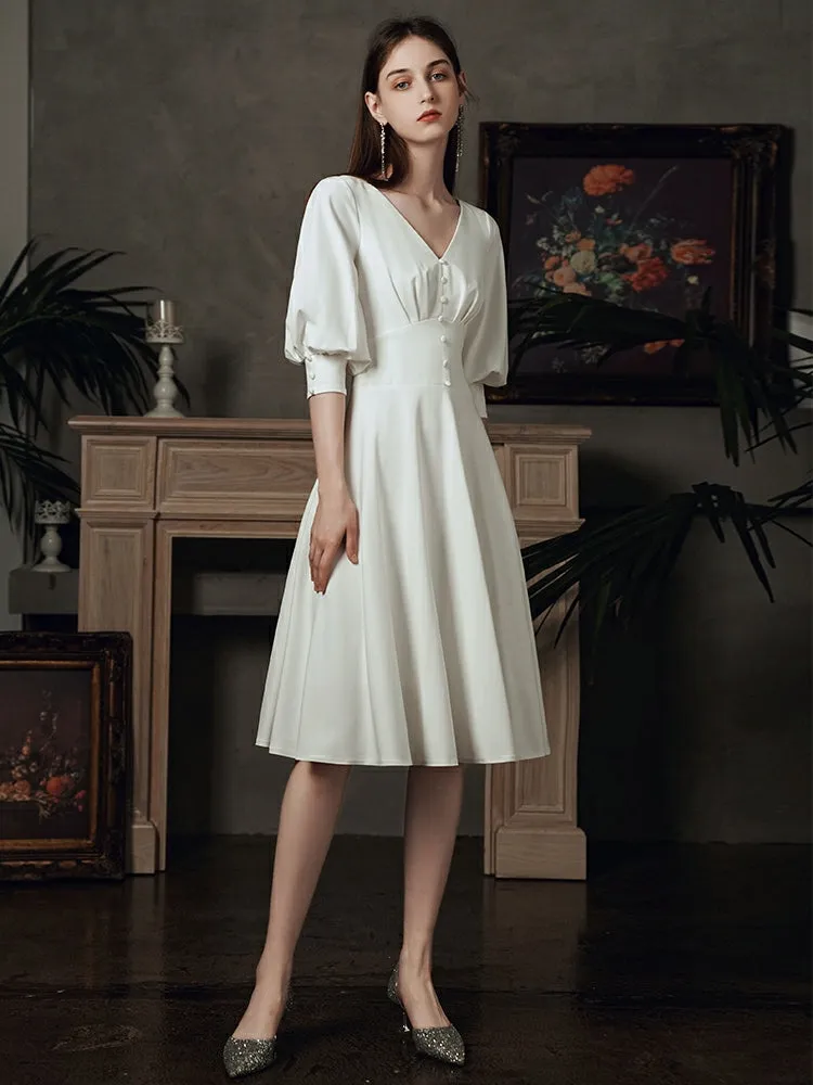 The Kelista Puff Sleeves Midi Gown
